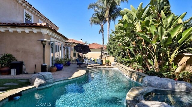 8531 10th St, Downey, CA 90241 - view of pool featuring a patio area and a pool with connected hot tub