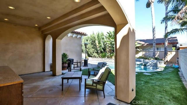 view of patio / terrace featuring a fenced in pool and a fenced backyard