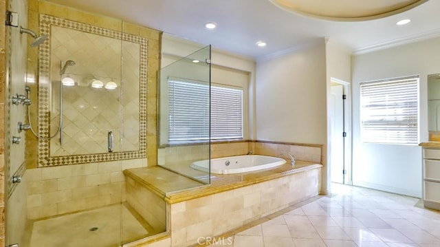 full bathroom featuring crown molding, recessed lighting, a bath, tile patterned floors, and a stall shower