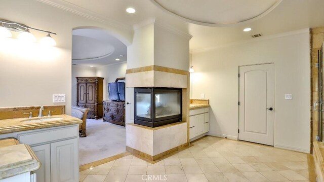8531 10th St, Downey, CA 90241 - full bath with crown molding, tile patterned flooring, a shower with door, recessed lighting, and vanity