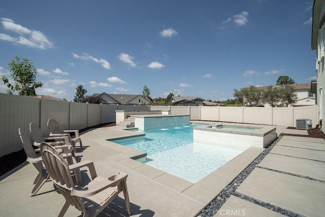 view of pool with a fenced backyard, a patio area, central air condition unit, and a pool with connected hot tub