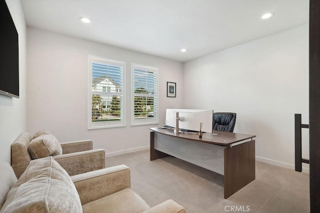 office space with recessed lighting, baseboards, and light colored carpet
