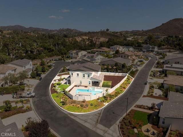 bird's eye view featuring a residential view and a mountain view