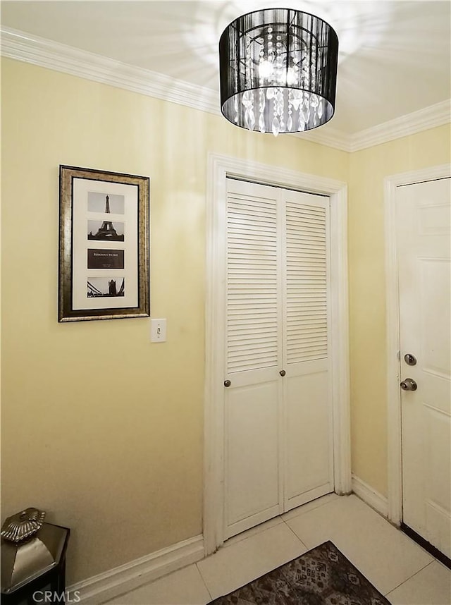 1150 W Capitol Unit 32, San Pedro, CA 90732 - doorway to outside featuring baseboards, ornamental molding, and light tile patterned floors
