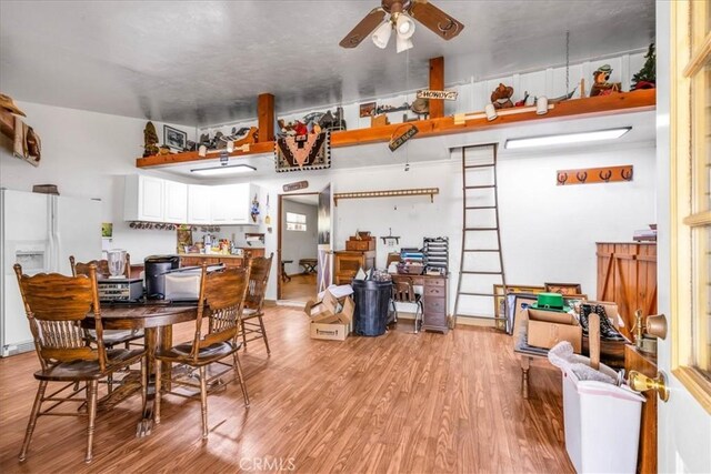 storage area with a ceiling fan