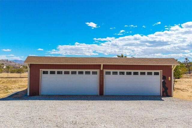 detached garage with a mountain view
