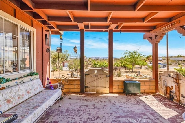 view of patio / terrace with a gate