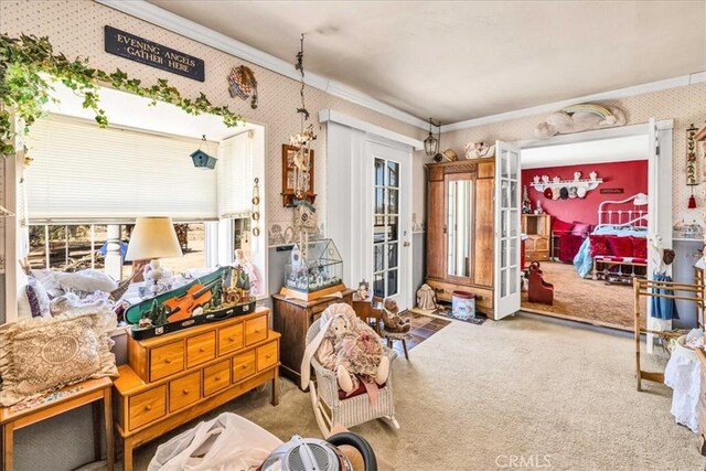 misc room featuring crown molding, carpet, and wallpapered walls