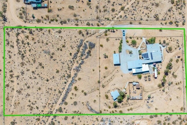 drone / aerial view with a desert view
