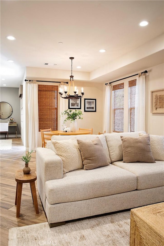 9369 Riberena Cir Unit 11, Atascadero, CA 93422 - living area featuring light wood-style flooring, recessed lighting, and a chandelier