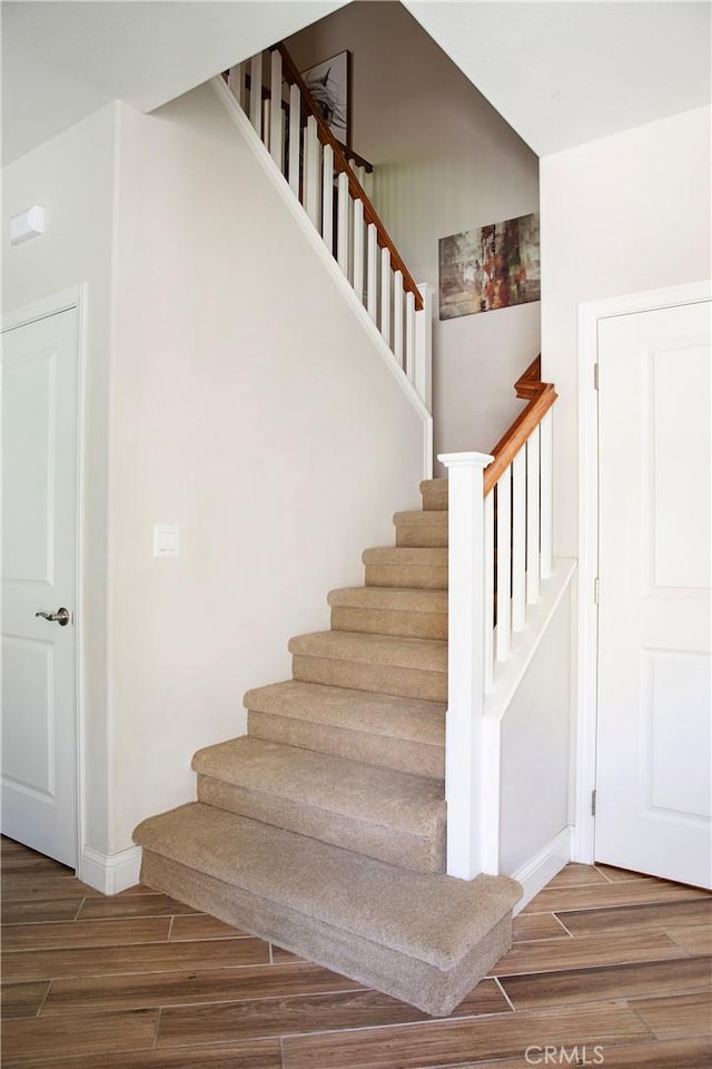 9369 Riberena Cir Unit 11, Atascadero, CA 93422 - staircase featuring wood finished floors