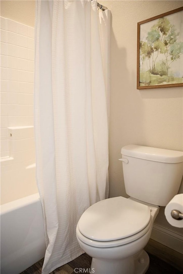 9369 Riberena Cir Unit 11, Atascadero, CA 93422 - bathroom featuring toilet and shower / bath combo with shower curtain
