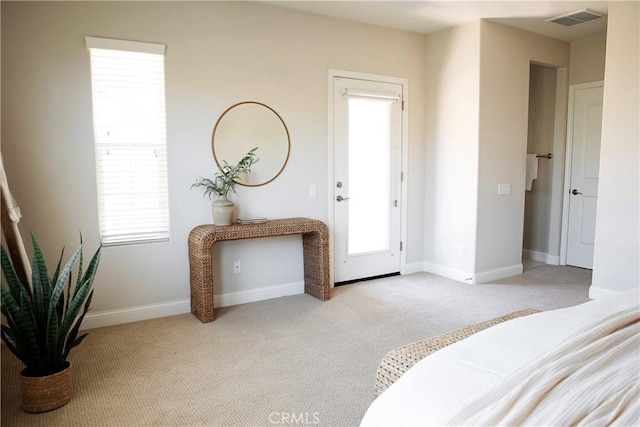 9369 Riberena Cir Unit 11, Atascadero, CA 93422 - bedroom featuring light colored carpet and multiple windows