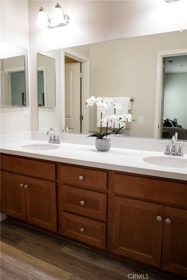9369 Riberena Cir Unit 11, Atascadero, CA 93422 - full bathroom featuring double vanity and wood finished floors