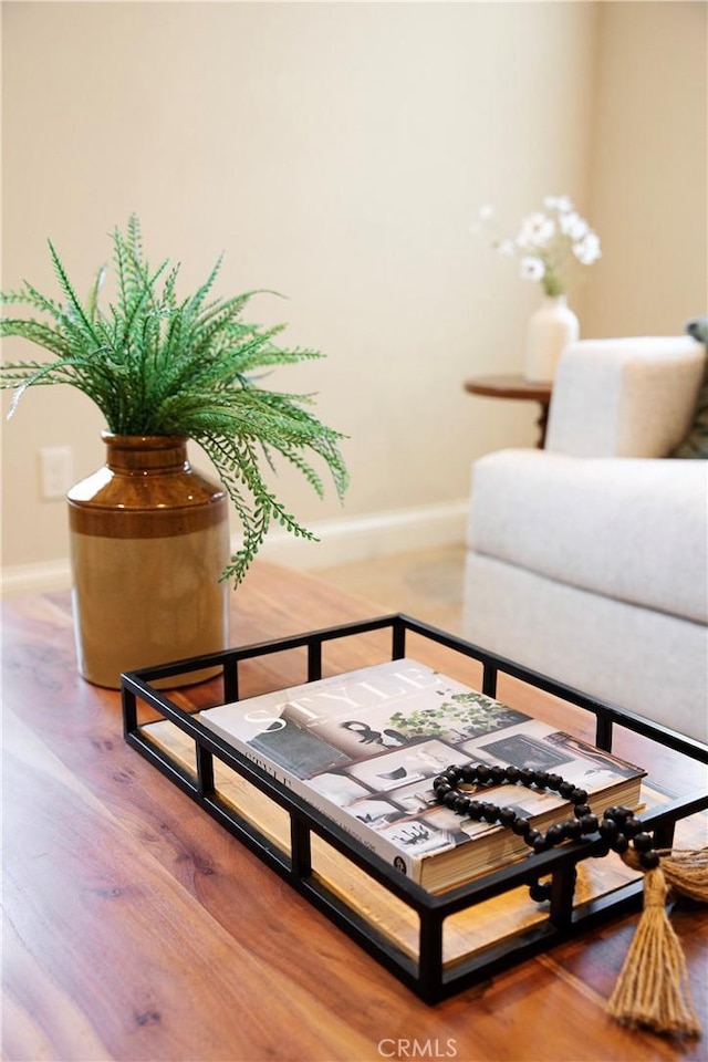 9369 Riberena Cir Unit 11, Atascadero, CA 93422 - sitting room with baseboards and wood finished floors
