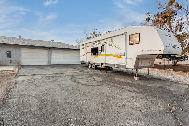 exterior space featuring a garage