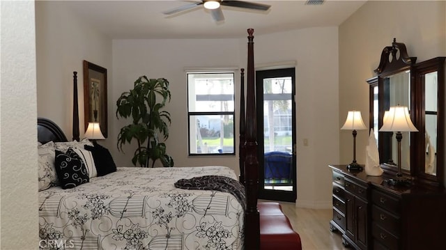 3615 Towhee Court, Punta Gorda, FL 33950 - bedroom with baseboards, light wood finished floors, ceiling fan, and access to exterior