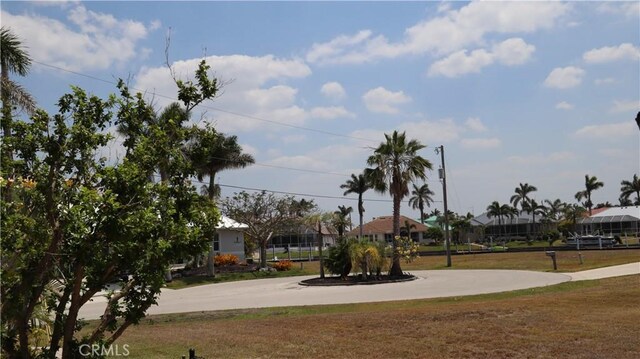 3615 Towhee Court, Punta Gorda, FL 33950 - surrounding community featuring a lawn