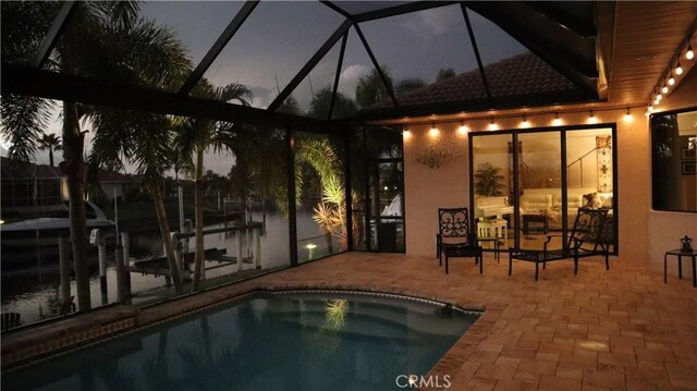 3615 Towhee Court, Punta Gorda, FL 33950 - outdoor pool featuring glass enclosure and a patio