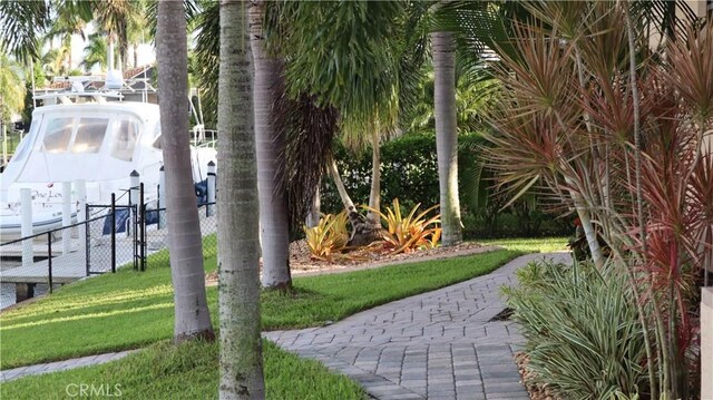 3615 Towhee Court, Punta Gorda, FL 33950 - view of home's community featuring a lawn and fence