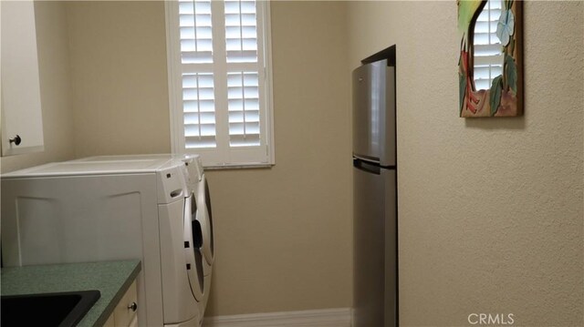 3615 Towhee Court, Punta Gorda, FL 33950 - washroom with laundry area and independent washer and dryer