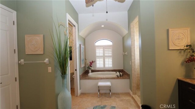 3615 Towhee Court, Punta Gorda, FL 33950 - bathroom featuring a tile shower, a garden tub, vanity, and ceiling fan