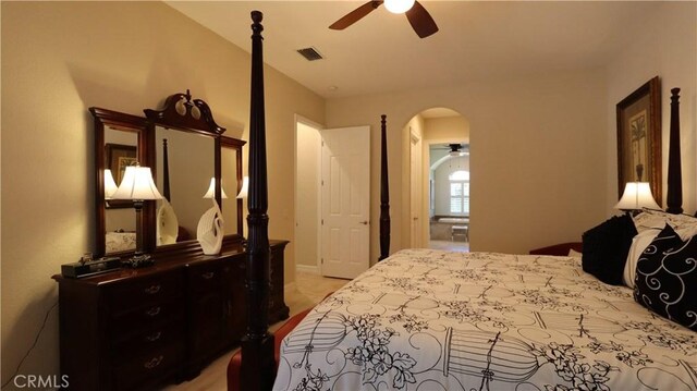 3615 Towhee Court, Punta Gorda, FL 33950 - bedroom with arched walkways, visible vents, and a ceiling fan