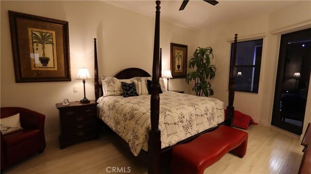 3615 Towhee Court, Punta Gorda, FL 33950 - bedroom featuring ceiling fan, baseboards, and wood finished floors