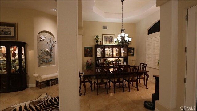 3615 Towhee Court, Punta Gorda, FL 33950 - dining room with baseboards, a notable chandelier, tile patterned floors, and visible vents