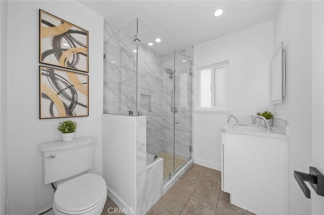 full bath featuring vanity, toilet, baseboards, recessed lighting, and a shower stall