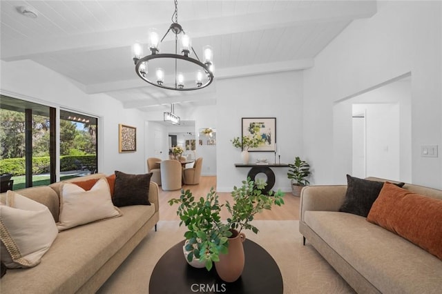 living area featuring an inviting chandelier, beamed ceiling, and wood finished floors