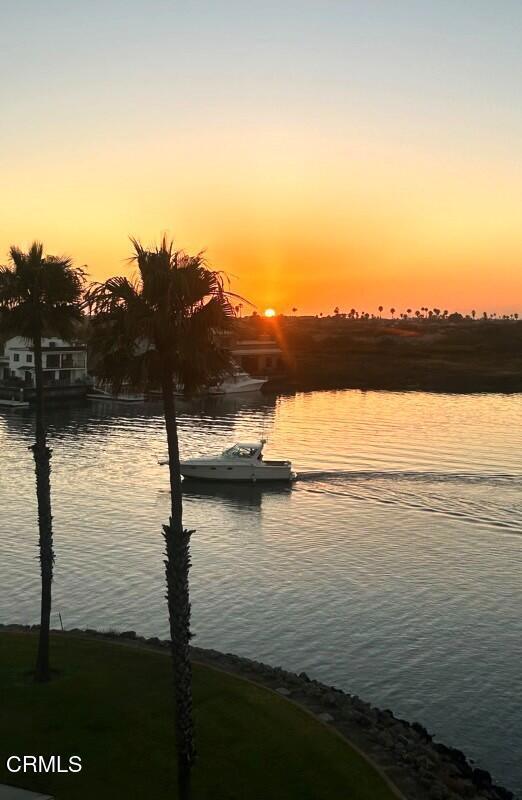 property view of water featuring a dock