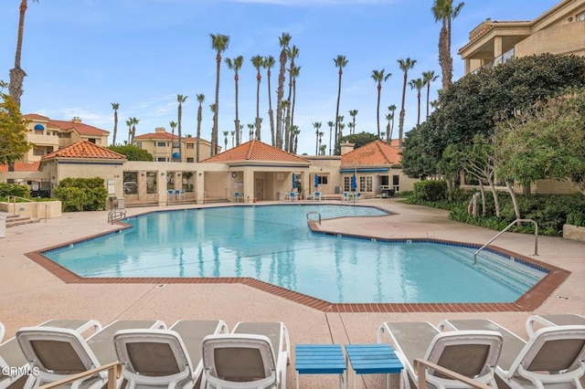 community pool featuring a patio