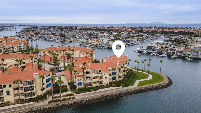 bird's eye view with a water view