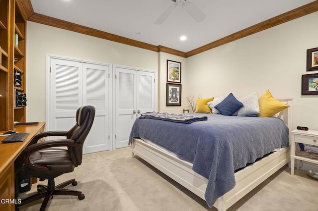 bedroom featuring carpet flooring, crown molding, two closets, ceiling fan, and recessed lighting