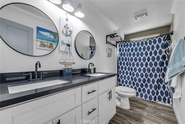 24 S La Salle St, Redlands, CA 92374 - full bathroom featuring crown molding, toilet, a sink, and double vanity