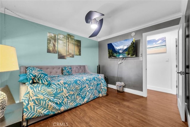 24 S La Salle St, Redlands, CA 92374 - bedroom featuring ceiling fan, baseboards, ornamental molding, and wood finished floors