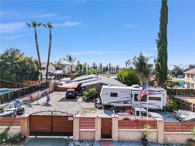 24 S La Salle St, Redlands, CA 92374 - exterior space featuring a fenced front yard and a gate