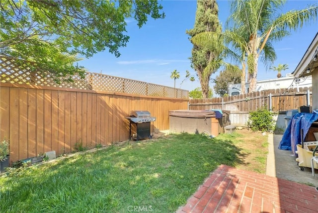 24 S La Salle St, Redlands, CA 92374 - view of yard with a fenced backyard, a patio area, and a covered hot tub