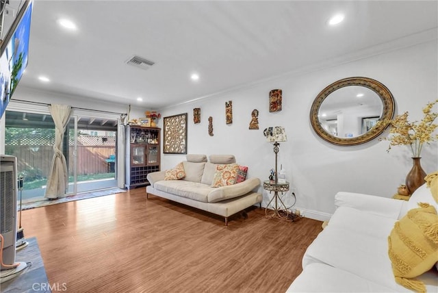 24 S La Salle St, Redlands, CA 92374 - living area with visible vents, ornamental molding, wood finished floors, baseboards, and recessed lighting
