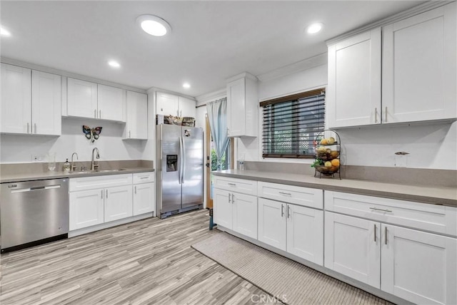 24 S La Salle St, Redlands, CA 92374 - kitchen featuring recessed lighting, white cabinetry, and appliances with stainless steel finishes