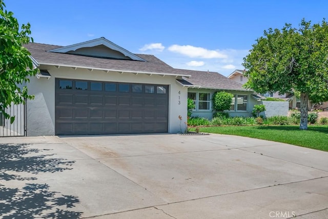 413 N Rimhurst Ave, Covina, CA 91724 - ranch-style house featuring an attached garage, roof with shingles, stucco siding, and concrete driveway