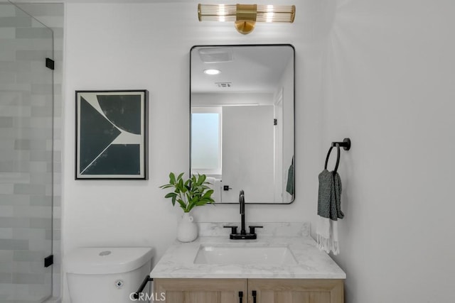413 N Rimhurst Ave, Covina, CA 91724 - bathroom featuring vanity, a stall shower, visible vents, and toilet