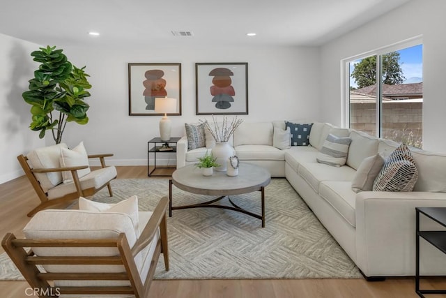 413 N Rimhurst Ave, Covina, CA 91724 - living room with visible vents, recessed lighting, baseboards, and wood finished floors