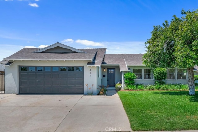 413 N Rimhurst Ave, Covina, CA 91724 - single story home featuring roof with shingles, an attached garage, stucco siding, a front yard, and driveway