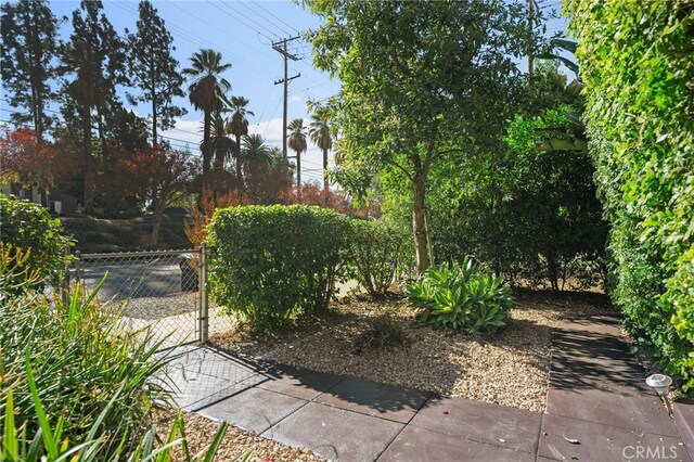 405 E Colton Ave, Redlands, CA 92374 - view of yard featuring fence and a gate