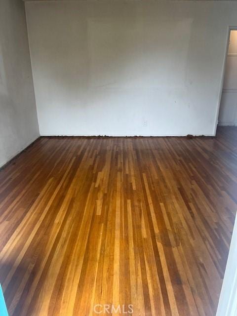 5548 Carley Ave, Whittier, CA 90601 - empty room with dark wood-style flooring