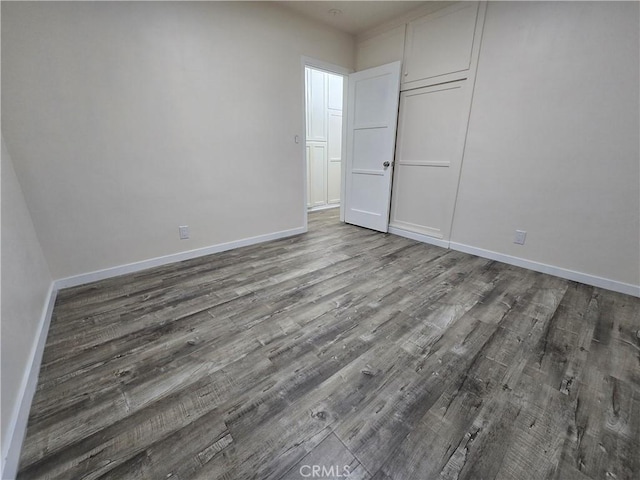 9412 Haney St, Pico Rivera, CA 90660 - unfurnished bedroom with wood finished floors, baseboards, and a closet