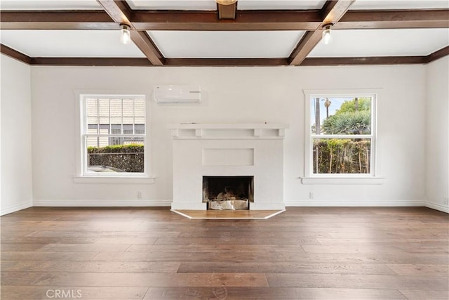 unfurnished living room with plenty of natural light, coffered ceiling, and beam ceiling