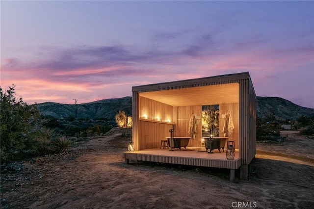 48575 Paradise Ave, Morongo Valley, CA 92256 - outdoor structure at dusk with a mountain view
